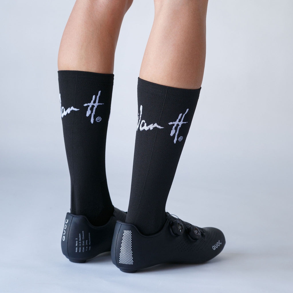 Black socks with white logo