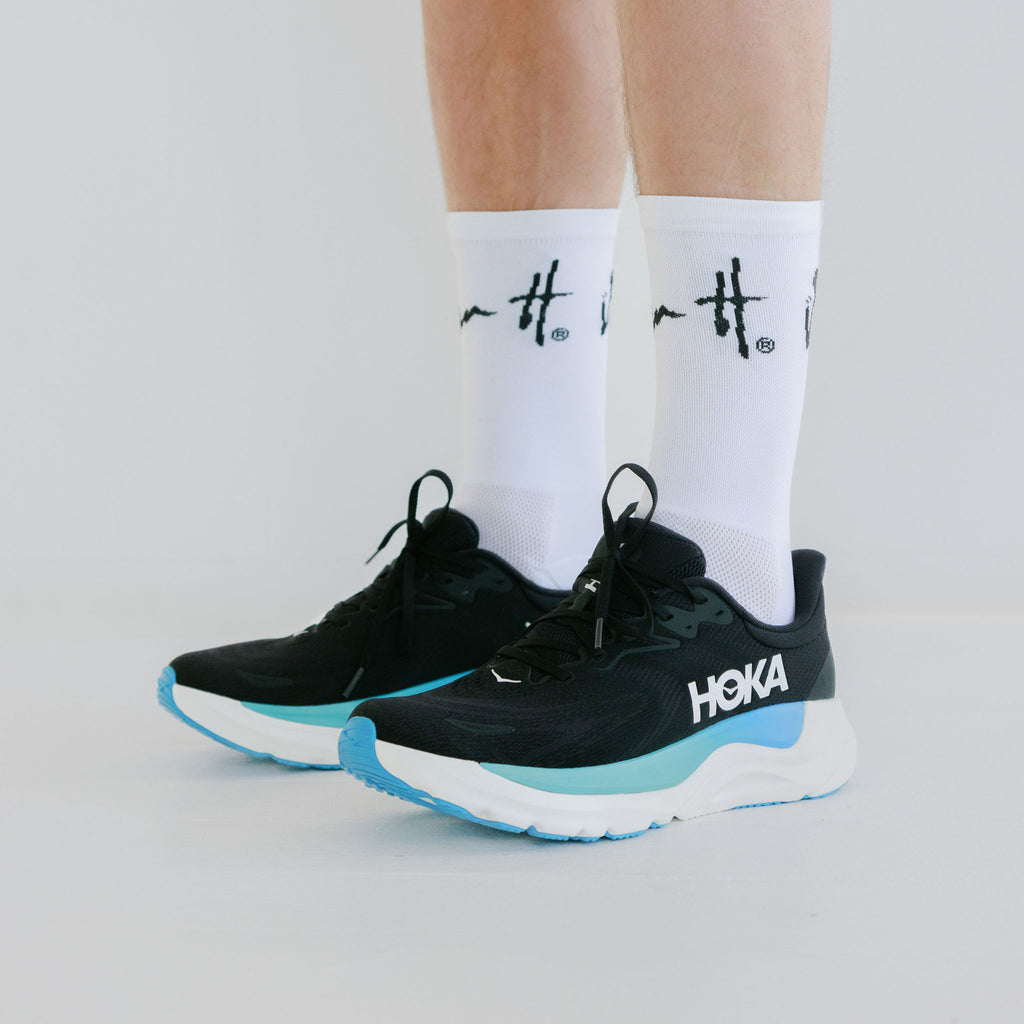 White socks with black logo