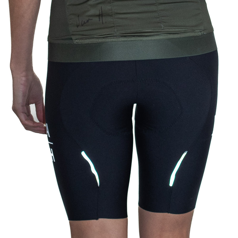 Back View of womens Black Top of the range Tourmalet Cycling bib displaying reflective properties, Front View of womens Black Top of the range Tourmalet Cycling bib, Cycling bib, cycling shorts, cycling tights, premium cycling bib, south Africa, Van H, cycling mens cycling bib, womens cycling bib, elastic interface